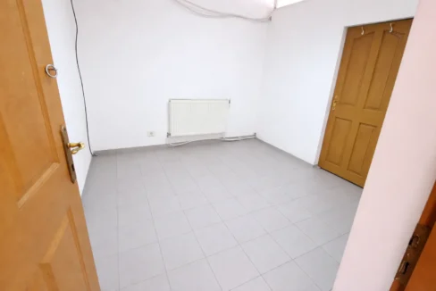 Empty room with white radiator